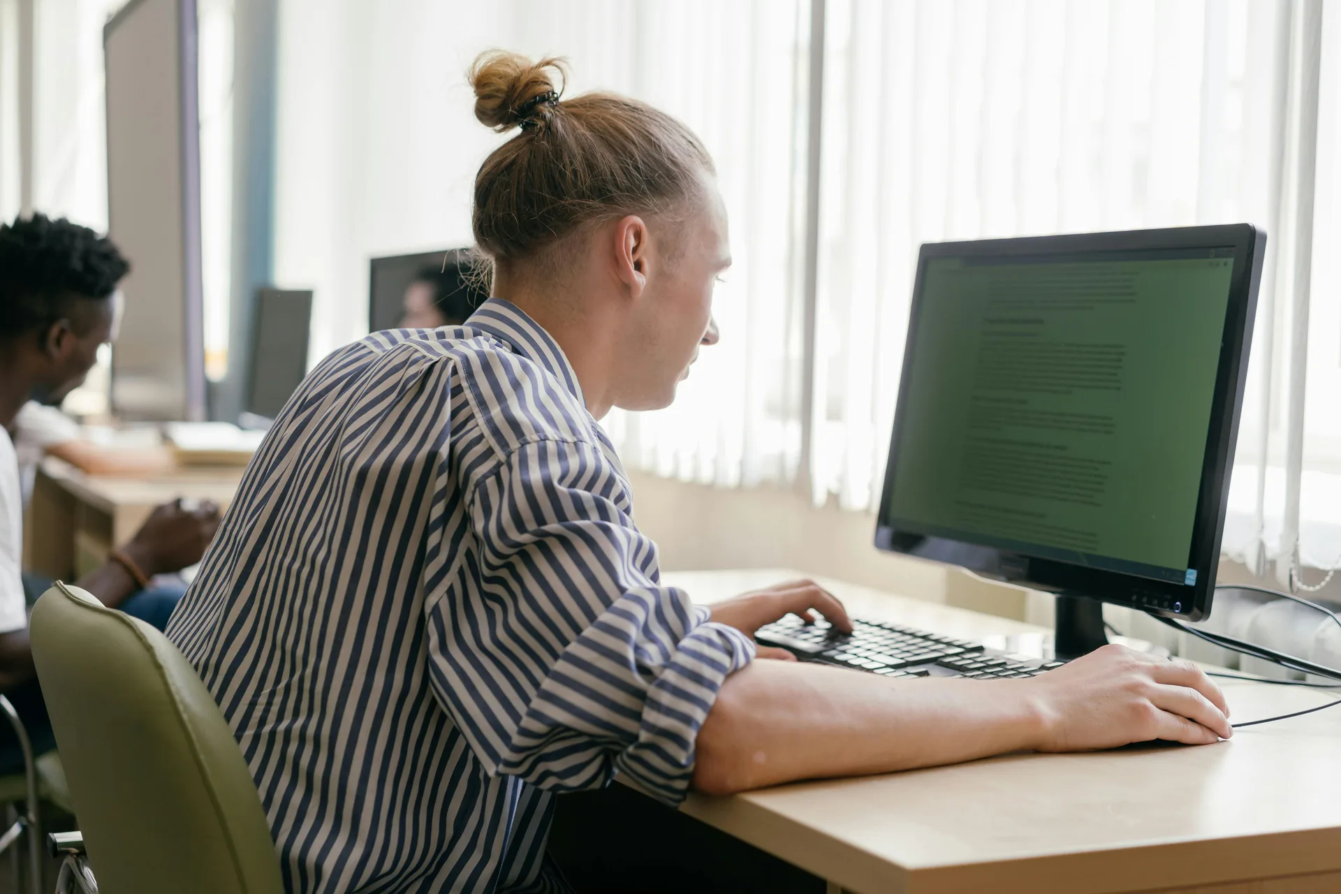 Équipe IT en formation professionnelle